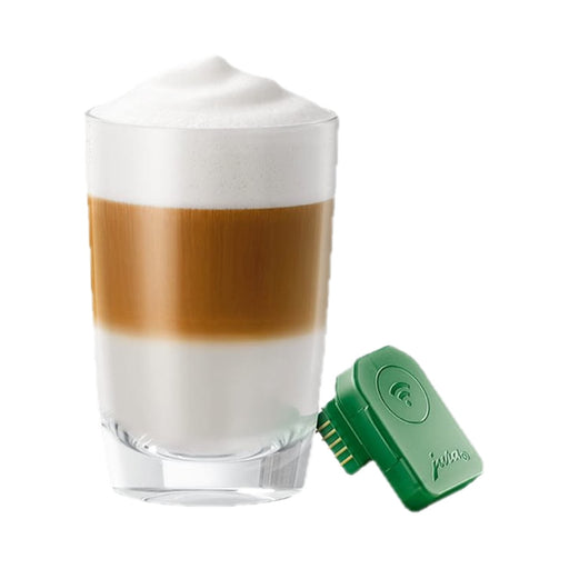 JURA Business Connect groene capsule naast cappuccino in glas met melkschuim | Arte dell' espressO