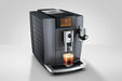 JURA E10 Onyx Grey, schuin vooraanzicht met espresso