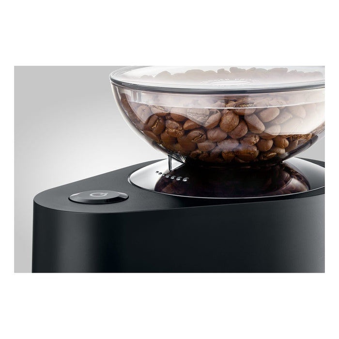 JURA Koffiemolen P.A.G. zwart (25048) met glazen reservoir vol koffiebonen en zwarte basis | Arte dell' espressO