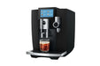 JURA S10 Obsidian Black, schuin vooraanzicht met espresso