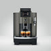 JURA W8 Dark Inox koffiemachine met twee gevulde glazen espresso op een grijze achtergrond