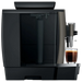 JURA W8 Dark Inox koffiemachine met een glas vers gezette koffie op de uitloop, geschikt voor zakelijk gebruik