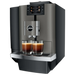 JURA X10 Dark Inox zakelijke koffiemachine met twee gevulde espressoglazen en een digitaal display
