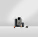 JURA X10 Dark Inox zakelijke koffiemachine met display en twee koffiespecialiteiten op tafel