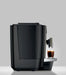 JURA X4 Dark Inox zakelijke koffiemachine in zijaanzicht met een kopje koffie op het dienblad