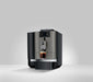JURA X4 Dark Inox zakelijke koffiemachine met touchscreen en kopje koffie eronder