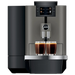 JURA X4 Dark Inox zakelijke koffiemachine met touchscreen en twee kopjes espresso in donkergrijze afwerking