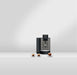 JURA X4 Dark Inox zakelijke koffiemachine met drie kopjes espresso op een rij